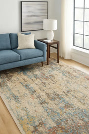 Ishani : Tapis Moderne aux Éclats de Bleu, Crème et Taupe