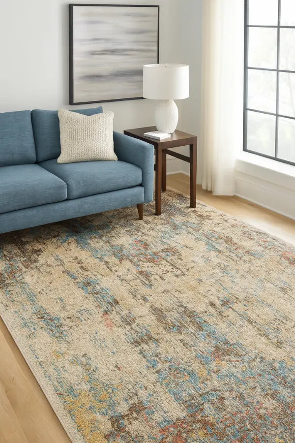 Ishani : Tapis Moderne aux Éclats de Bleu, Crème et Taupe