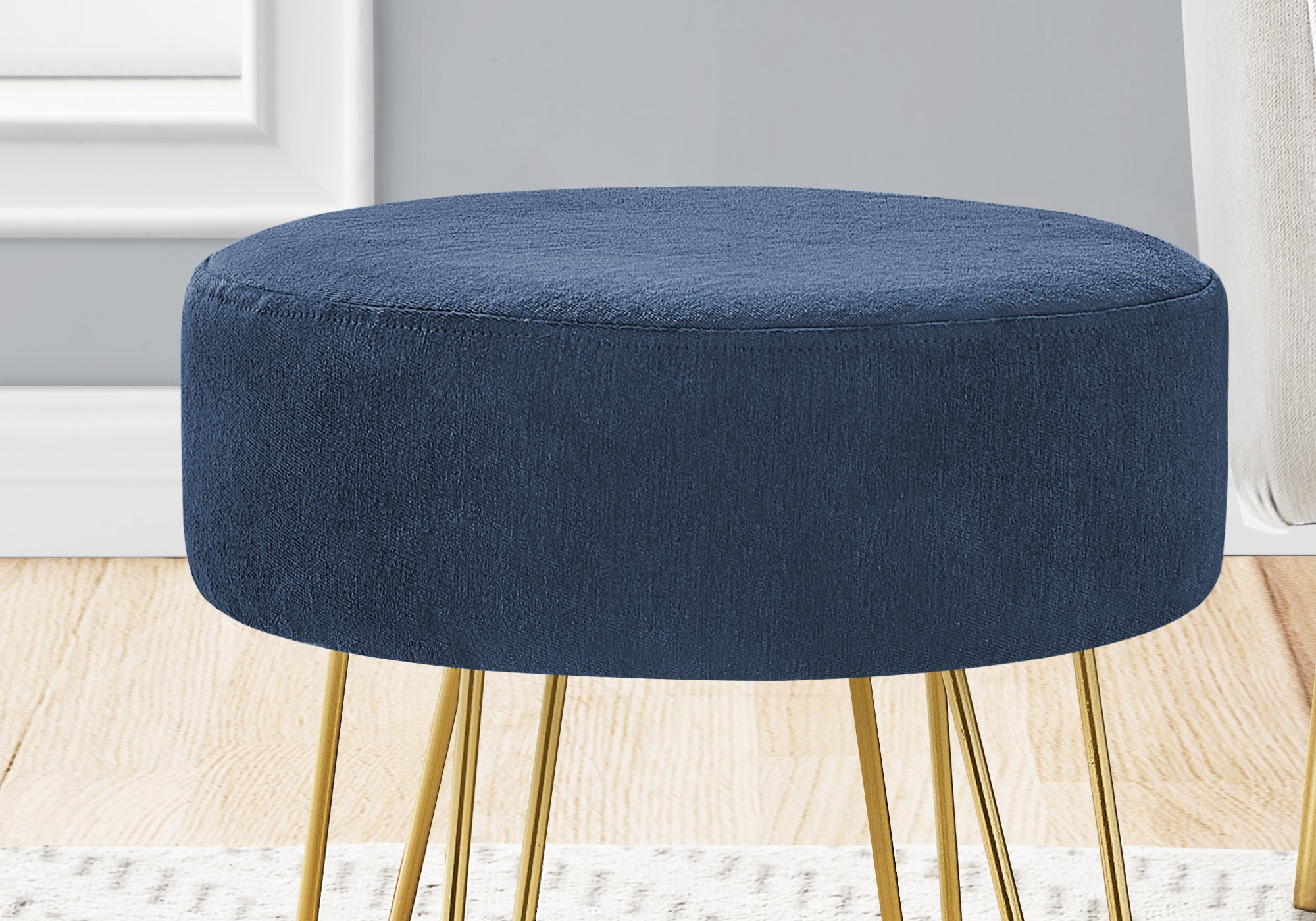 POUF - TISSU BLEU / PIEDS EN MÉTAL DORÉ